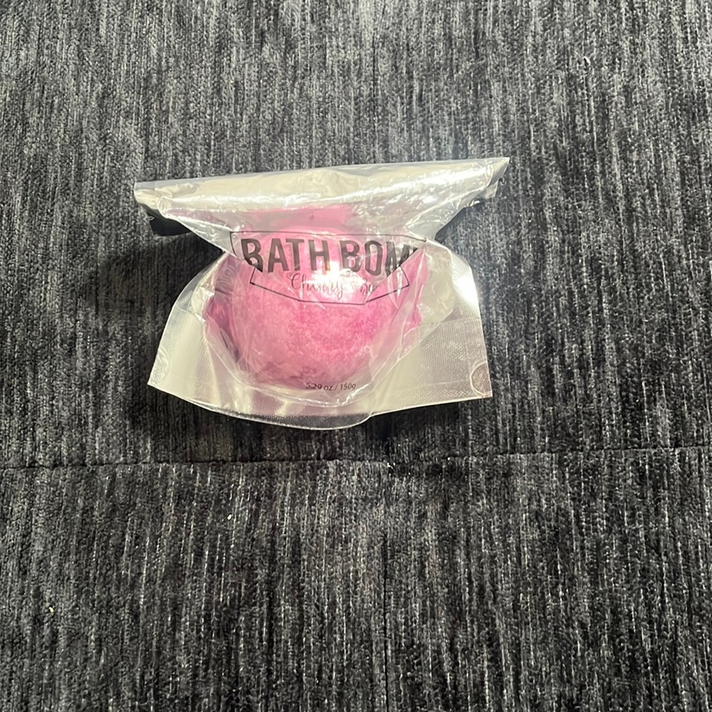 Brand is cherry bomb. It’s a pinkish purple bath-bomb.